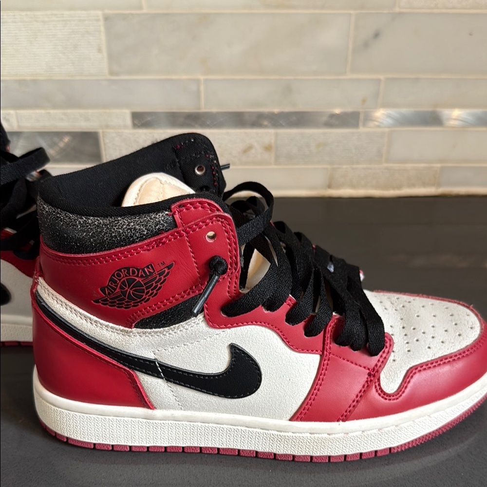 Kids Jordan Red and Black Sneakers